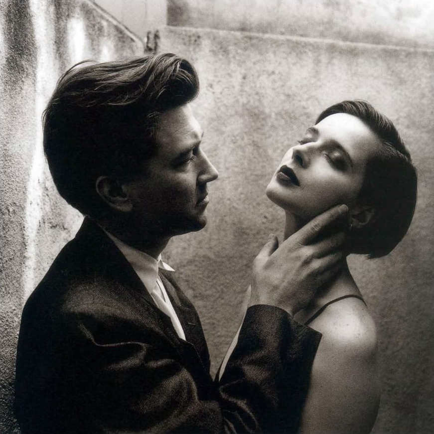 A photograph of David Lynch & Isabella Rossellini, in Los Angeles, by Helmut Newton.